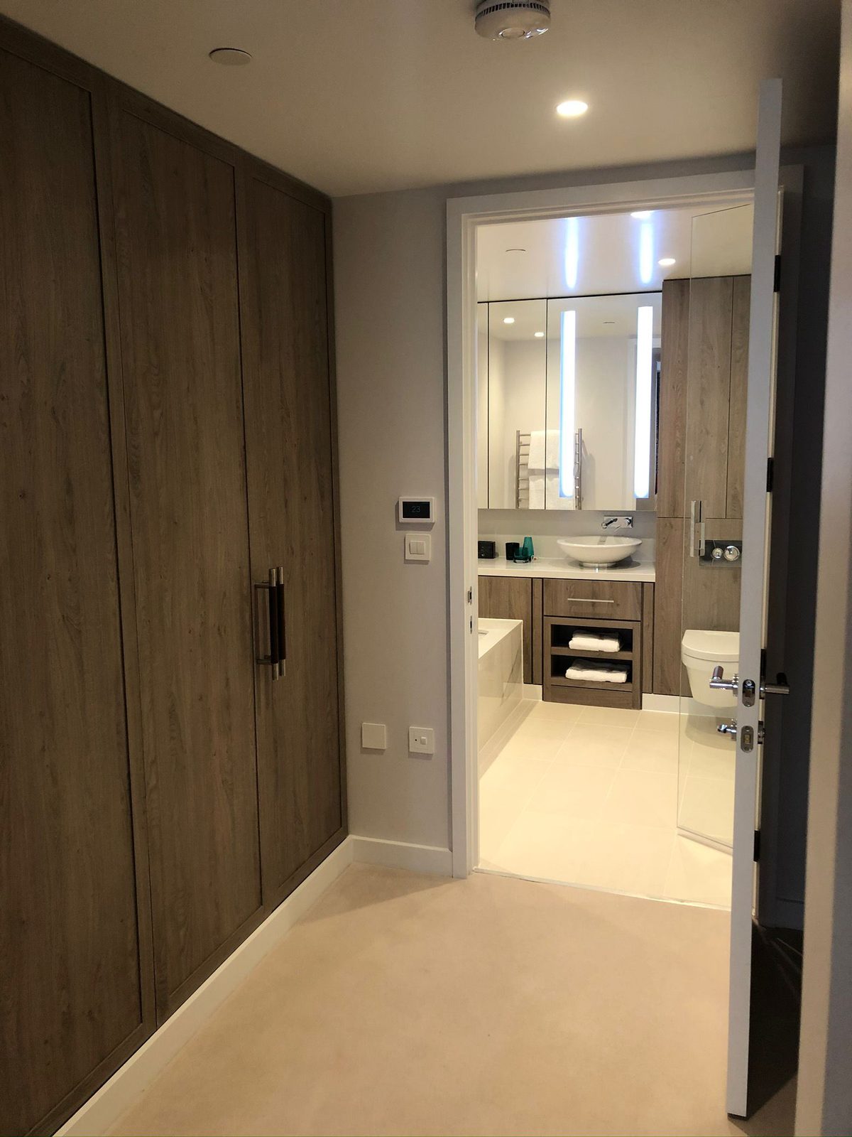 High-end apartment bathroom with integrated storage Bedford