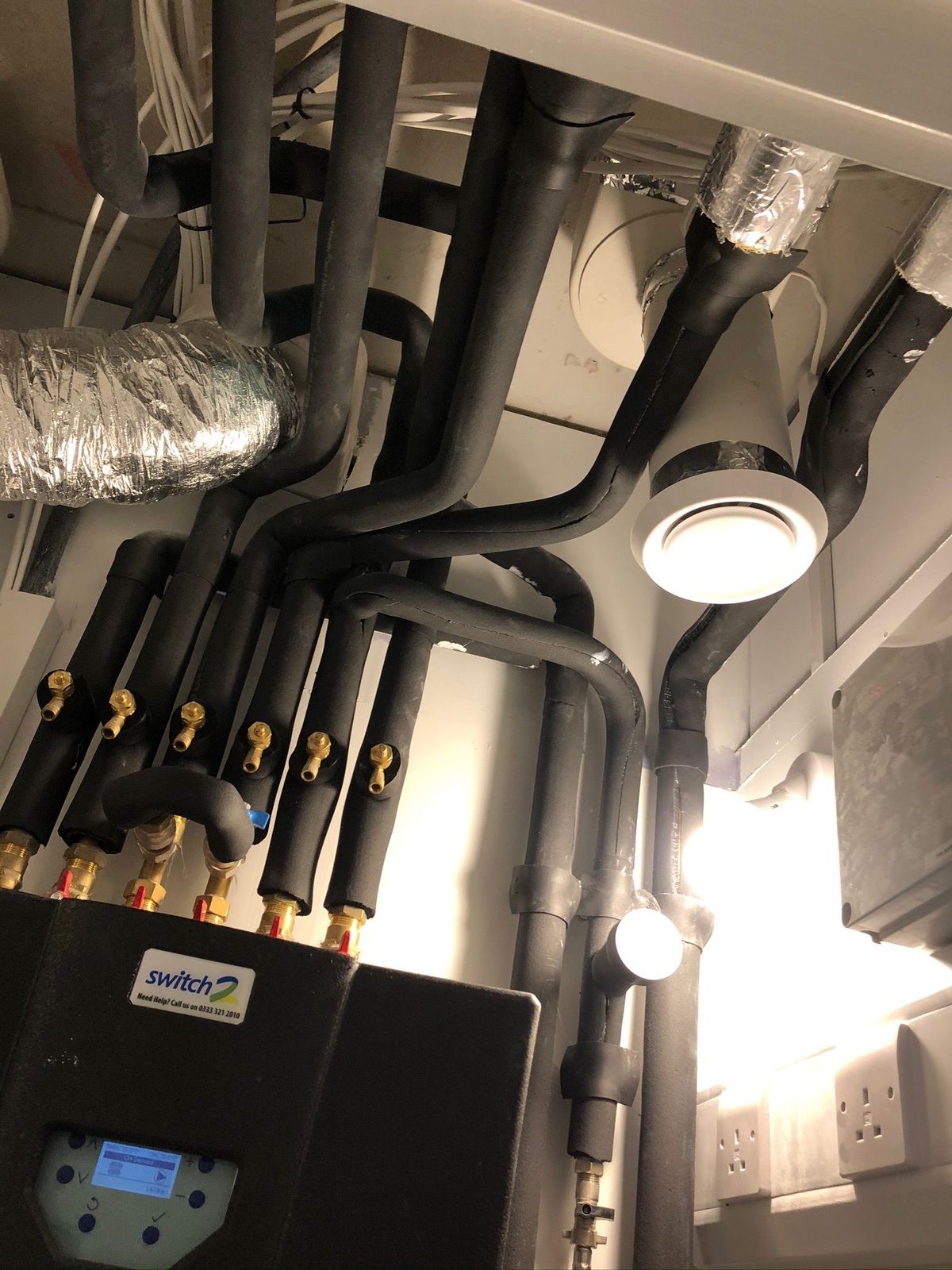 Smart heating system installation in Bedford home with remote control